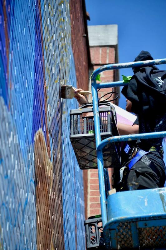 Artist Devona Stimpson creating mural in downtown Hagerstown